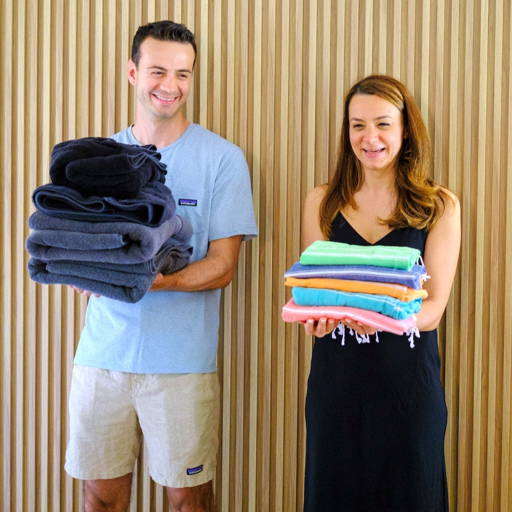 wetcat's co-founders, Bediz and Ugur, holding towels in a shoot