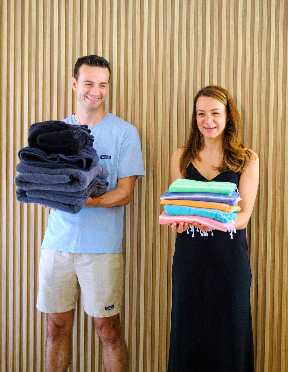 wetcat's co-founders, Bediz and Ugur, holding towels in a shoot